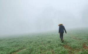 person grieving after leaving faith community