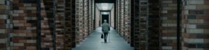 man walking on hallway